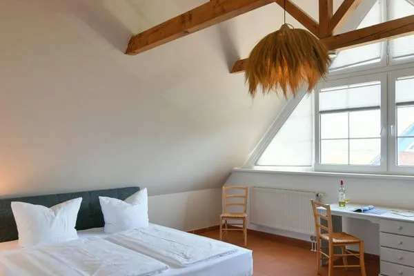 Schlafzimmer Ferienhaus am Gutspark Dranske Ferienwohnung Sonnenliebe