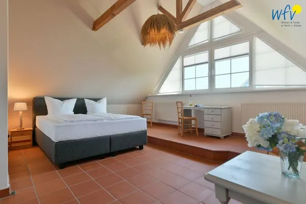 Schlafzimmer Ferienhaus am Gutspark Dranske Ferienwohnung Sonnenliebe