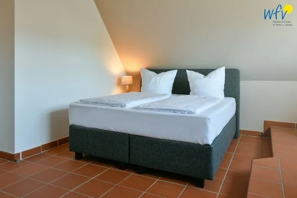 Schlafzimmer Ferienhaus am Gutspark Dranske Ferienwohnung Sonnenliebe