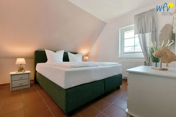 Schlafzimmer Ferienhaus am Gutspark Dranske Ferienwohnung Sonnenmorgen