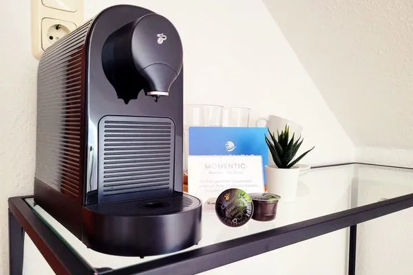 Caffissimo Kaffeemaschine mit 2 Willkommens-Pads  Kostengünstige & charmante Ferienunterkunft ohne Küche und in Strandnähe - inkl. Fahrradunterstellplatz