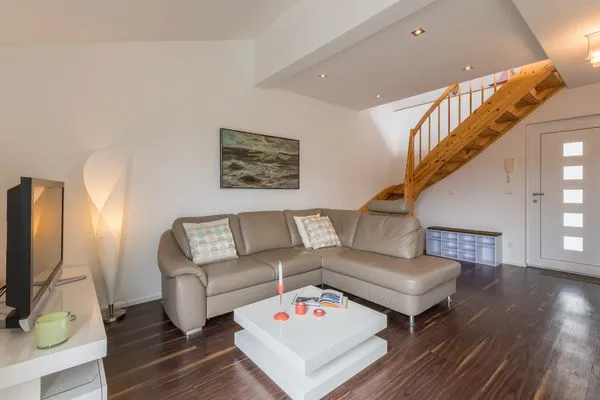 Wohnzimmer  Kurpark Carré 37 Galeriewohnung