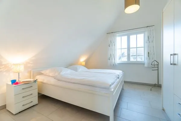 Schlafzimmer  Ferienhaus am Dünenwald