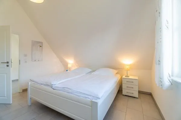 Schlafzimmer  Ferienhaus am Dünenwald