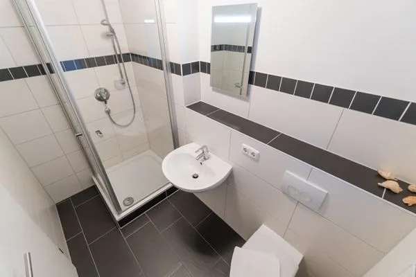 Badezimmer  Kurpark Carré 28 Dünenrose