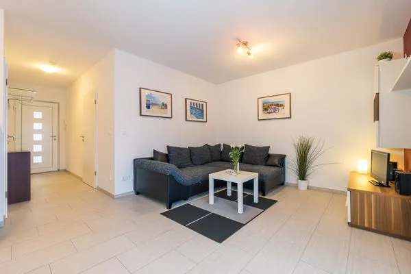 Wohnzimmer  Kurpark Carré 28 Dünenrose