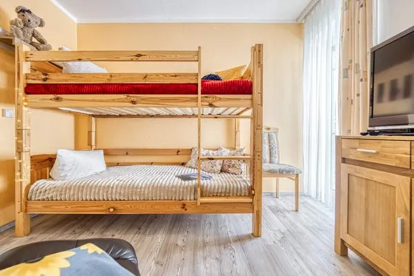 Schlafzimmer mit Etagenbett Parkresidenz am Hafen Wohnung HF 34