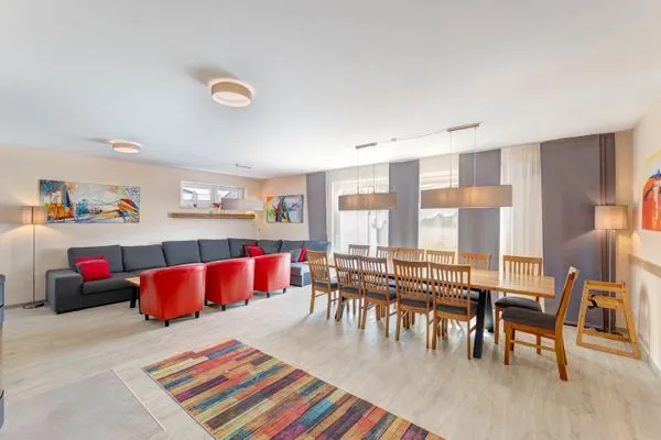Wohnzimmer  Ferienhaus Sanddornweg ca.400m vom Meer mit 6 Schlafzimmern, Sauna und Kamin