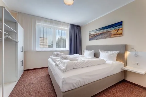 Schlafzimmer  Ferienhaus Sanddornweg ca.400m vom Meer mit 6 Schlafzimmern, Sauna und Kamin