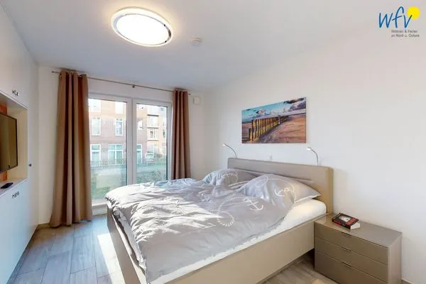 Schlafzimmer Haus Seeblick Ferienwohnung Nordseekieker