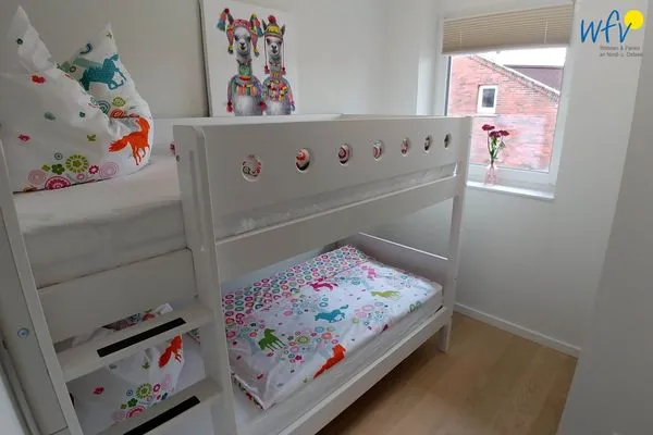 Schlafzimmer Villa Petersen Ferienwohnung Traumblick