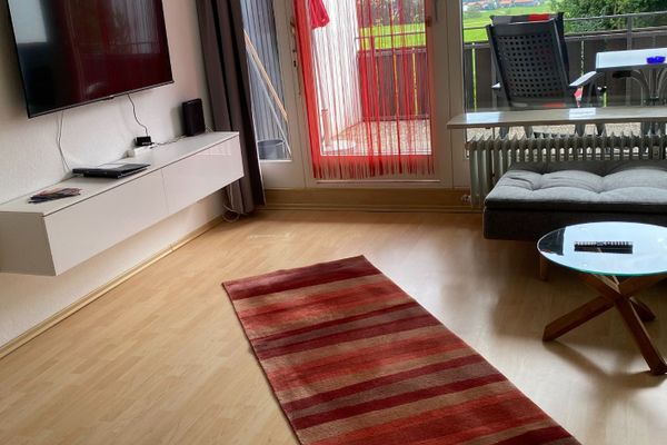  Ferienappartement Panoramablick Ferienwohnungen in Hopfen am See - Wohnzimmer