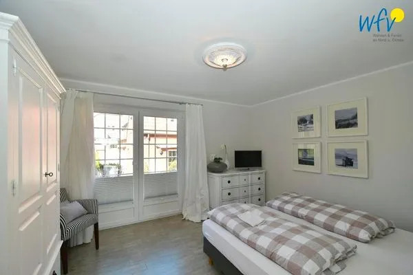 Schlafzimmer Landhaus Gertrude Ferienwohnung Muschelweg