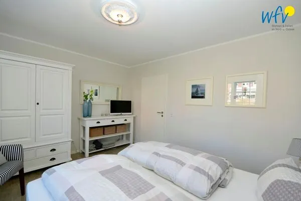 Schlafzimmer Landhaus Gertrude Ferienwohnung Muschelweg