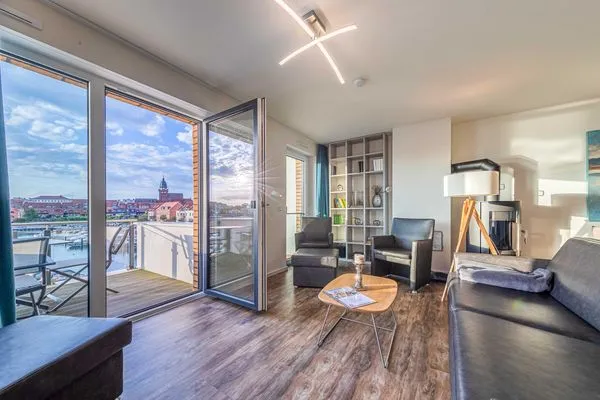 Ferienwohnung Hafenflair Hafenresidenz Waren (Müritz) - Wohnzimmer mit Hafenblick  Hafenflair