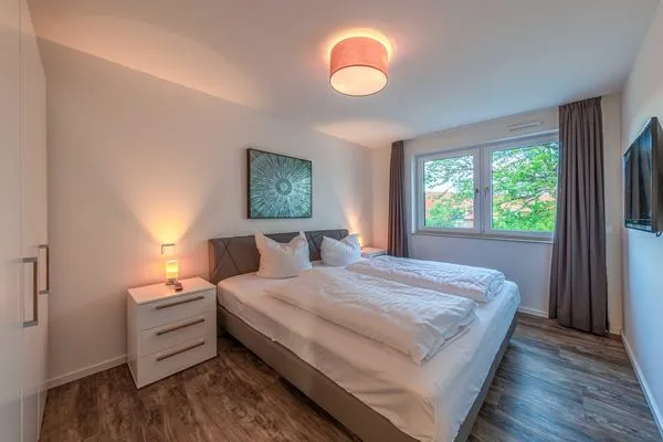 Ferienwohnung Hafenflair Hafenresidenz Waren (Müritz) - Schlafzimmer mit Doppelbett  Hafenflair