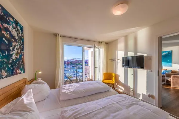 Ferienwohnung Hafenperle Hafenresidenz Waren (Müritz) - Schlafzimmer mit Wasserblick  Hafenperle