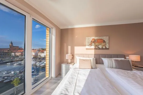 Ferienwohnung Entschleunigung Hafenresidenz - Schlafzimmer mit Doppelbett  Entschleunigung