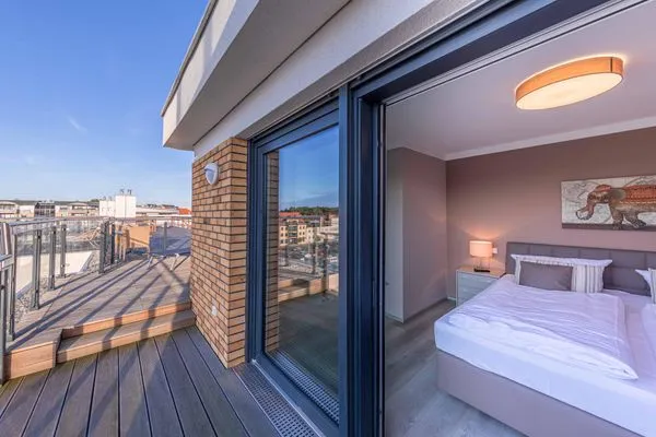 Ferienwohnung Entschleunigung Hafenresidenz - Schlafzimmer mit Panorama-Terrasse  Entschleunigung