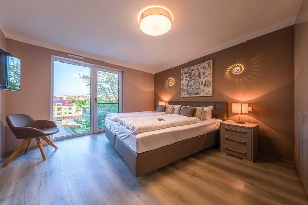 Ferienwohnung Auszeit Hafenresidenz Waren (Müritz) - Schlafzimmer mit Doppelbett  Auszeit