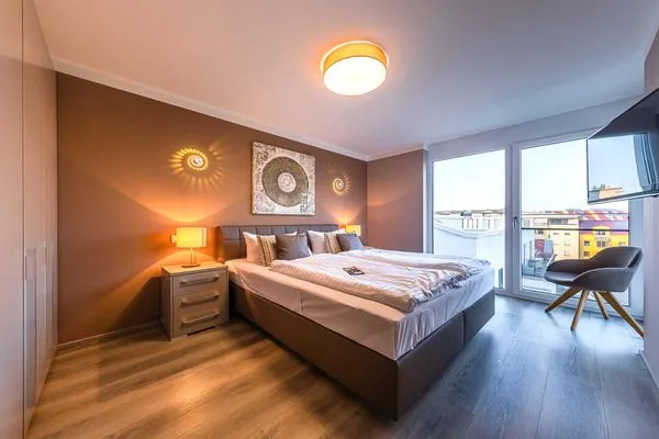 Ferienwohnung Auszeit Hafenresidenz Waren (Müritz) - Schlafzimmer mit Doppelbett  Auszeit