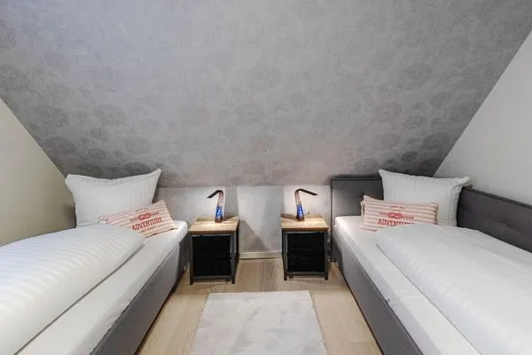 Ferienhaus Wasserblick Schlafzimmer mit zwei Einzelbetten  Wasserblick