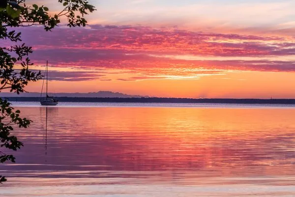 Ferienhaus InselGlück in Malchow Sonnenuntergang über der Müritz  InselGlück