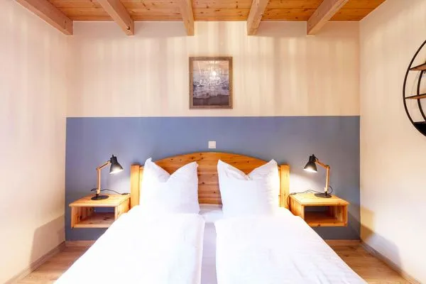 Ferienhaus Blau am See Blick in eines der Schlafzimnmer  Blau am See