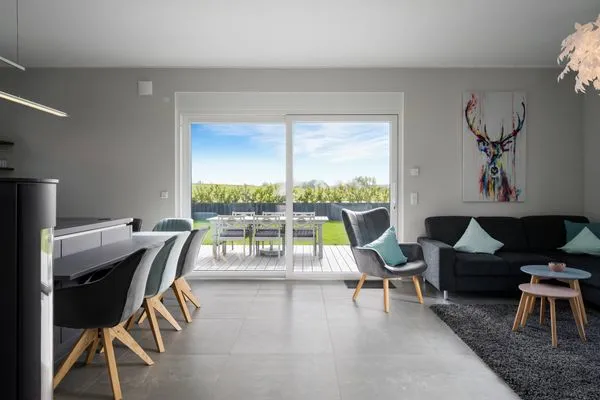 Ferienhaus Duncan House offener Wohnbereich mit Zugang zur Terasse  Duncan House