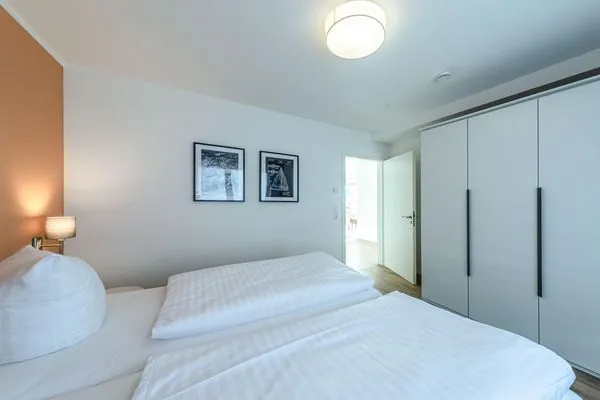 Ferienwohnung Wasserlilie Malchow Schlafzimmer mit Doppelbett  Wasserlilie