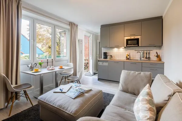 Wohnzimmer/Sofa  Ferienhaus Nils Holgersson - Wohnung 1