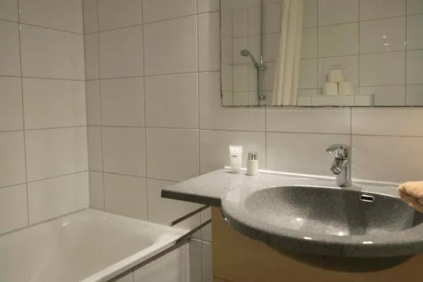 Badezimmer  Ferienhaus Nils Holgersson - Wohnung 2