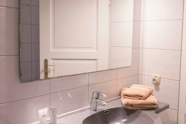 Badezimmer  Ferienhaus Nils Holgersson - Wohnung 2