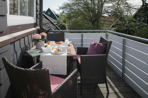 Balkon mit Gartenblick  Gästehaus Orion - Wohnung 10