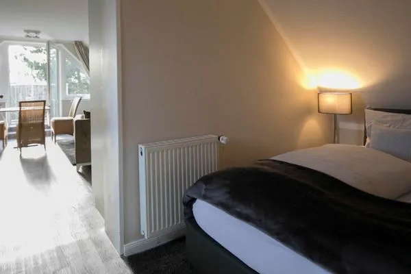 Schlafzimmer Gästehaus Orion - Wohnung 12