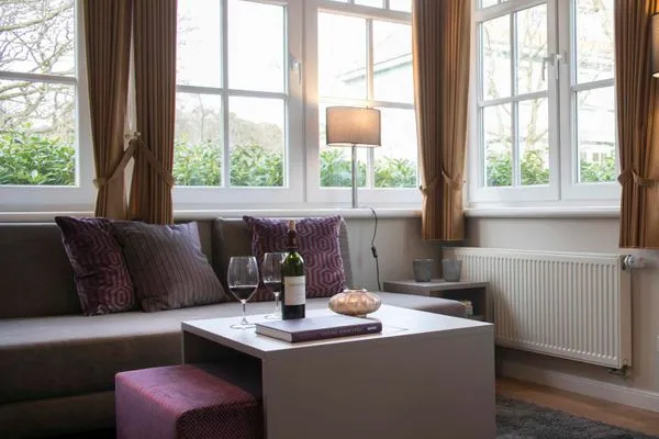 Wohnzimmer/Sofa  Gästehaus Orion - Wohnung 14