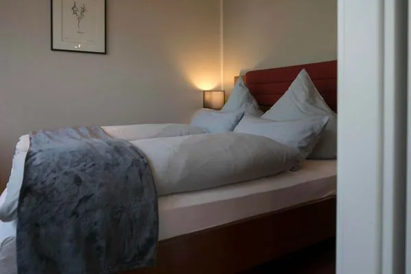 Schlafzimmer Gästehaus Orion - Wohnung 14