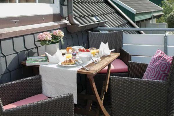 Balkon mit Gartenblick  Gästehaus Orion - Wohnung 3