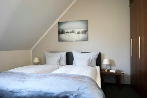 Schlafzimmer Gästehaus Orion - Wohnung 4