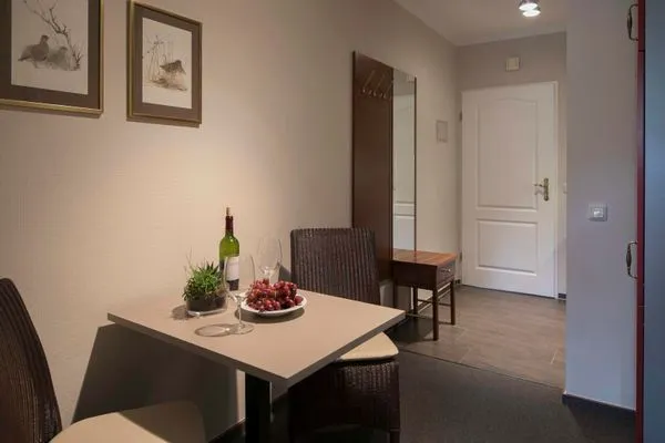 Esstisch  Gästehaus Orion - Wohnung 7