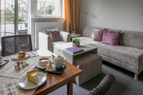 Wohnzimmer/Sofa Gästehaus Orion - Wohnung 9