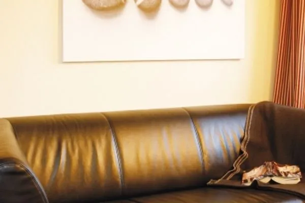 Wohnzimmer/Sofa  Ferienhaus Pirola - Dachgeschoss