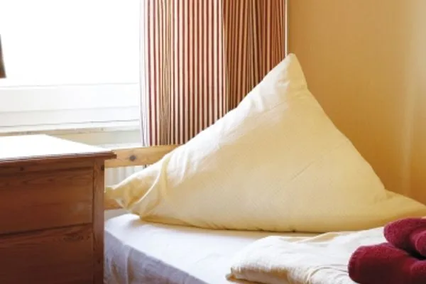 Schlafzimmer  Ferienhaus Pirola - Dachgeschoss