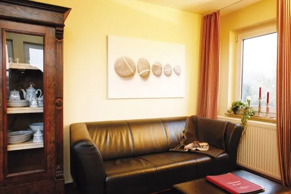 Wohnzimmer/Sofa  Ferienhaus Pirola - Dachgeschoss