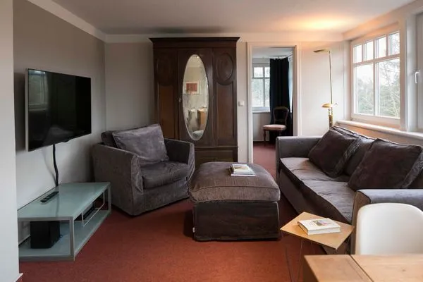 Wohnzimmer/Sofa  Ferienhaus Pirola - Erdgeschoss