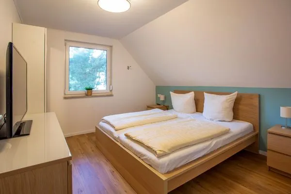 Ferienwohnung Merlin Ausguck Röbel/Müritz - Schlafzimmer mit Doppelbett  Merlin Ausguck