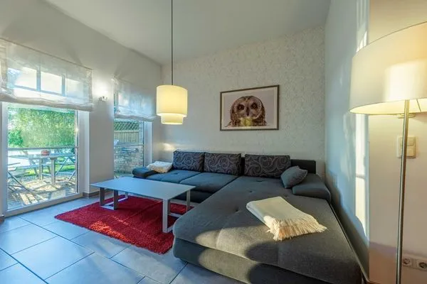 Ferienwohnung Stockente Wohnzimmer mit Zugang zur Terasse  Stockente