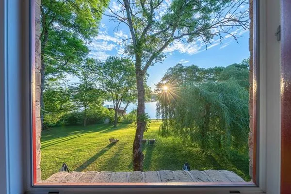 Ferienwohnung Zwergtaucher Blick aus dem Fenster auf den See  Zwergtaucher