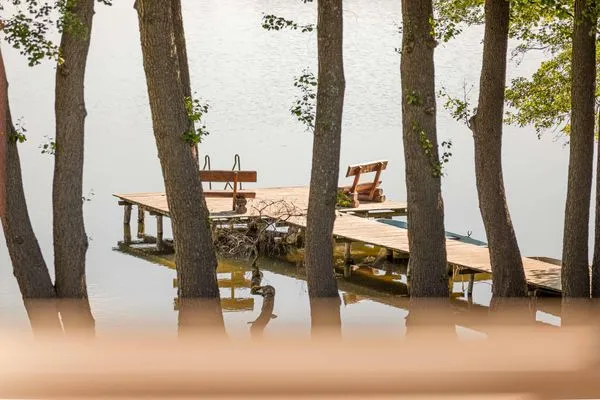 Ferienwohnung Zwergtaucher Blick aus dem Fenster auf den Steg  Zwergtaucher