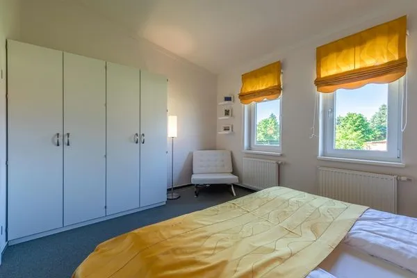 Ferienwohnung Zwergtaucher Schlafzimmer mit Doppelbett  Zwergtaucher